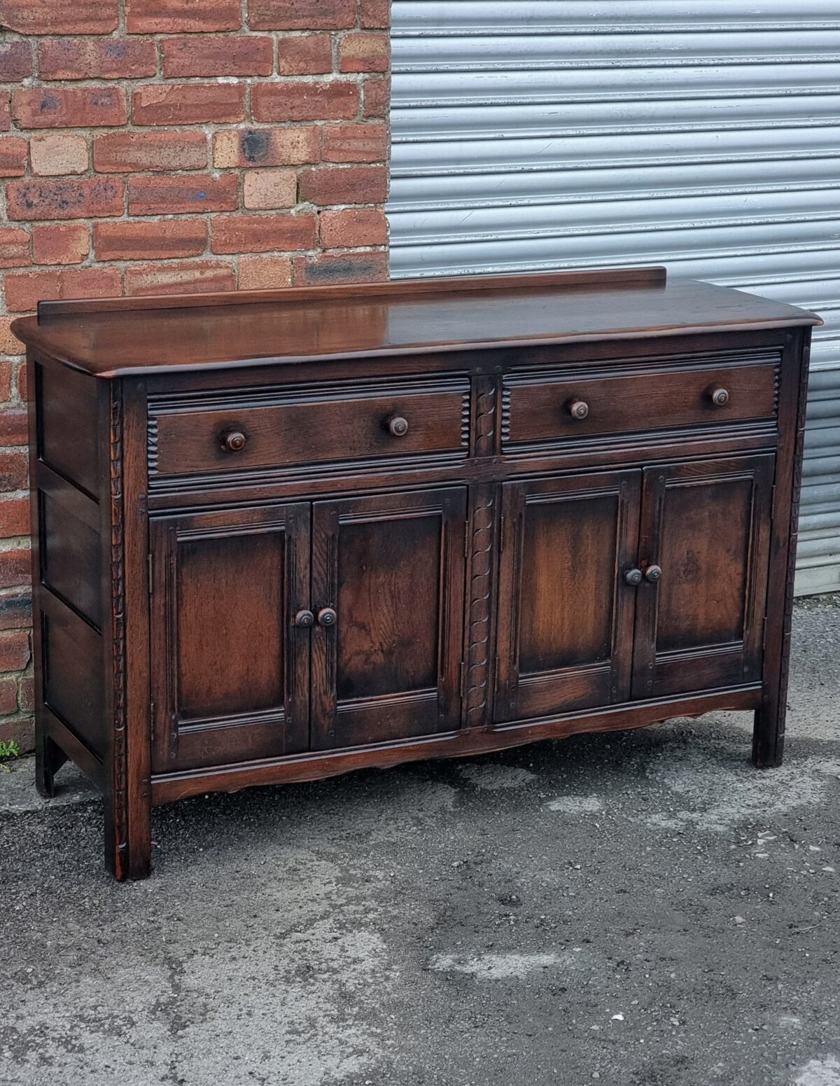 'Ercol' Oak Sideboard, 'Ercol' Cupboard with two Drawers above two door Cabinets below