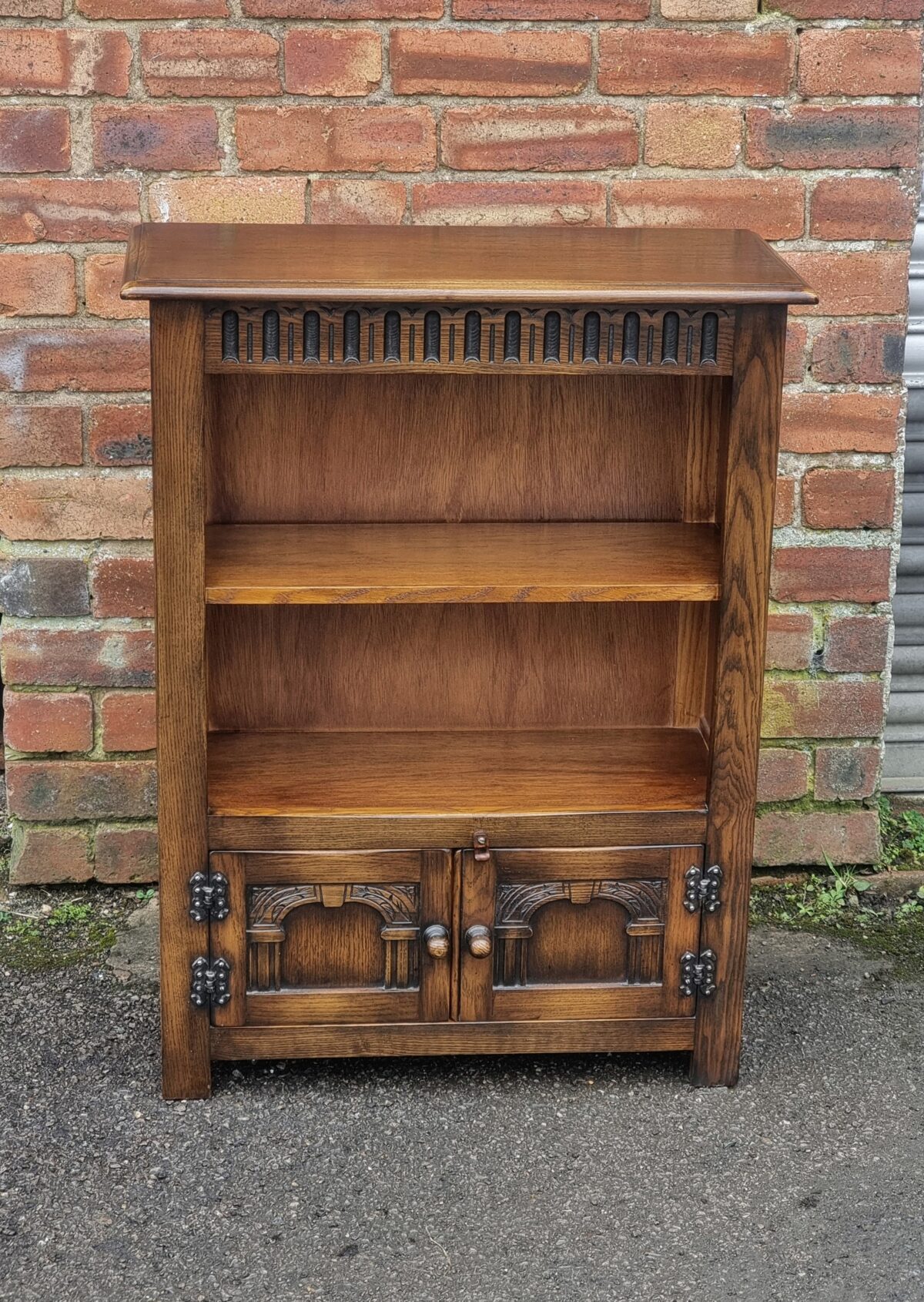 Antique style Small Oak Bookcase, Oak Small Bookcase / Bookshelf with Small Cupboard below with Carved Panel Doors - Image 3