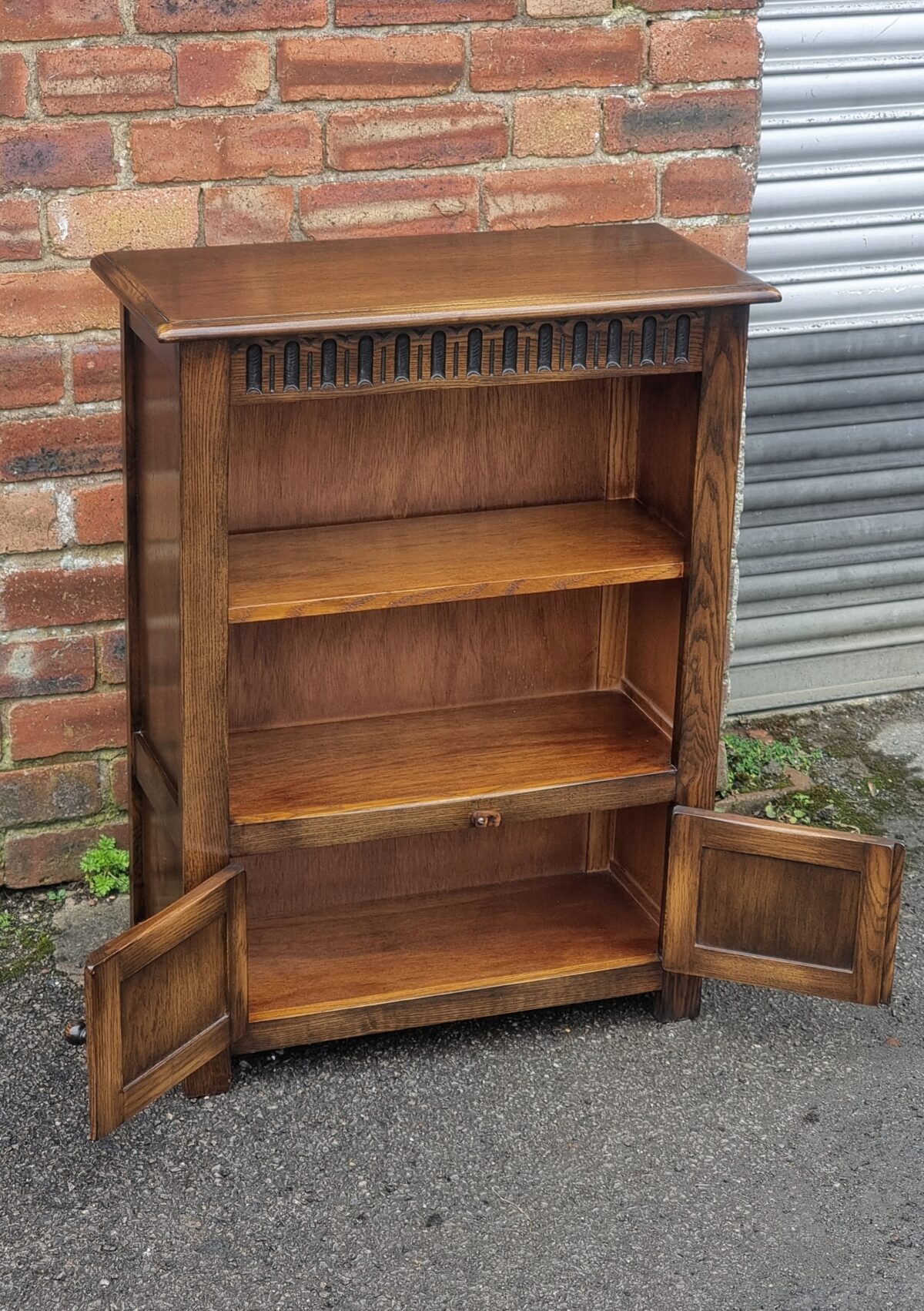 Antique style Small Oak Bookcase, Oak Small Bookcase / Bookshelf with Small Cupboard below with Carved Panel Doors - Image 2